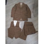 A three piece wool suit made for Sir John Mills by Bermans & Nathans costumes,