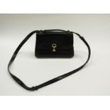 CELINE: A black leather shoulder bag,