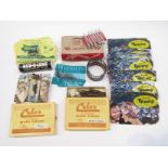 A box containing assorted vintage hair dressing accessories including Jeanette Raywarp