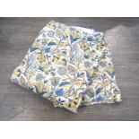 A super king quilted bedspread in yellow and blue, Persian floral style,