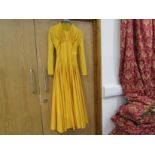 EMILIA WICKSTEAD: Sun flower yellow 1950's style dress, open back,