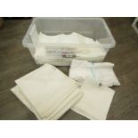 A lidded storage box containing a quantity of Cowdray Park / Dunecht House table napkins including