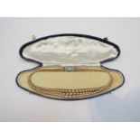 Vintage triple row of Pompadour Pearls in original fitted case