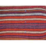 A late 19th Century Iranian hand woven Jajim, stripe design in orange, navy,