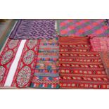 An impressive collection of ethnic embroideries and weavings to include Indian, Asian, Uzbek,