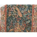A modern machine woven wall hanging tapestry depicting peacocks in a stylized naturalistic setting,