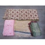 Four assorted bedspreads and table covers,