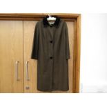 An Aquasutum for Harrods 1950's black and olive two tone day coat with a velvet black collar
