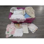 A box containing mainly table linens and a good quantity of napkins