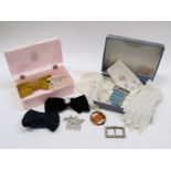 Pink cameo vanity box of hair combs and slides,