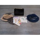 A box containing good quality black crocodile handbag, vintage felt hats,