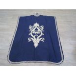 A navy wool kaftan reportedly from Kasmir with hand embroidery detail