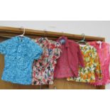 Five various blouses in assorted styles and fabrics