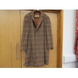 An Aquascutum Middle 20th Century brown wool check gents single breasted coat