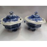 A pair of blue and white lidded tureens