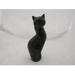 A stylized figure of a black cat,