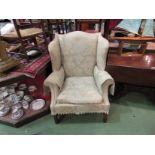 A George III style wingback chair