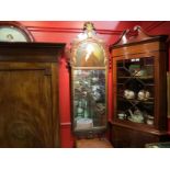 A George III pier mirror with portrait above and feathered helmet crest,