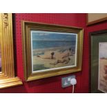 A coloured print after Paul Fischer of three naked females on a beach, gilt framed and glazed,