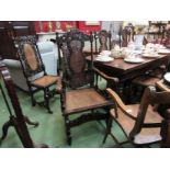 A set of six (4 side 2 elbow) Charles II revival carved walnut bergère dining chairs with coronet