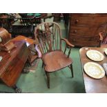 A pair of 19th Century wheel-back Windsor armchairs,