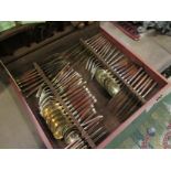 canteen of Thai bronze cutlery, teak handles, six complete place settings, plus serving spoons,