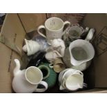 A box containing various jugs including Ironstone, Parian figure,