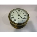 A 6" brass ships bulkhead ships clock with a platform movement