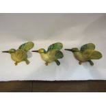 Three ceramic flying birds, Kingfishers,