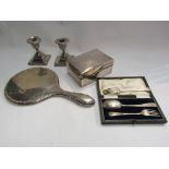 A quantity of silver items including candlesticks, mirror,