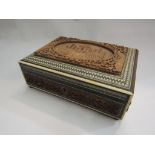 An Indian box with carved Taj Mahal scene