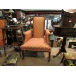 An Edwardian mahogany line and mother-of-pearl inlaid lounge chair