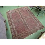 A red geometric design ground four panel design rug border, a/f ,