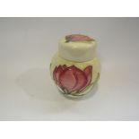 A Moorcroft lidded pot, Magnolia pattern,