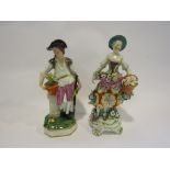 A 19th Century Derby porcelain figure of a gardener standing beside a potted flower,