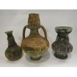 Two antique style pottery jugs and a Roman style bottle