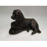 A figure of a Labrador.