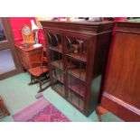 A "Rosjohn" George III style mahogany astragal glazed two door bookcase with height adjustable