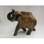 A painted wooden Indian elephant figure