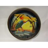 A Walter Moorcroft charger decorated with heron,