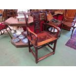 An elm Chinese armchair with carved panel central splat,