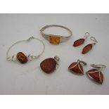 A selection of Amber jewellery including earrings, bracelets,