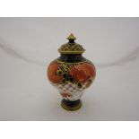 A Royal Crown Derby Imari palette small lidded vase of pedestal inverted baluster form,