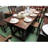 A Charles II revival pegged oak extending refectory dining table on turned legs joined by