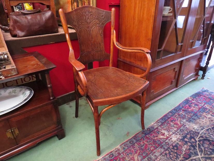 Circa 1900 a "Jacob and Josef Kohn" of Vienna Arts and Crafts bentwood elbow chair with embossed