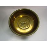 An early 20th Century Bavarian brass bowl with embossed dear design,