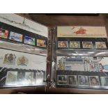 An album of Royal Mail stamp presentation packs