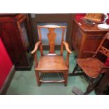 A Georgian elm child's carver chair with vase form splat,