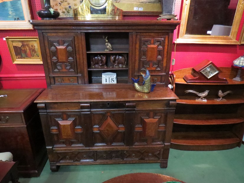 An 18th Century oak and walnut veneer court cupboard with linen fold side panels, - Image 2 of 3