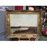 ANTHONY DUGDALE (XX): An ornate gilt framed oil on canvas, "Sunset over the Waveney near St Olaves".